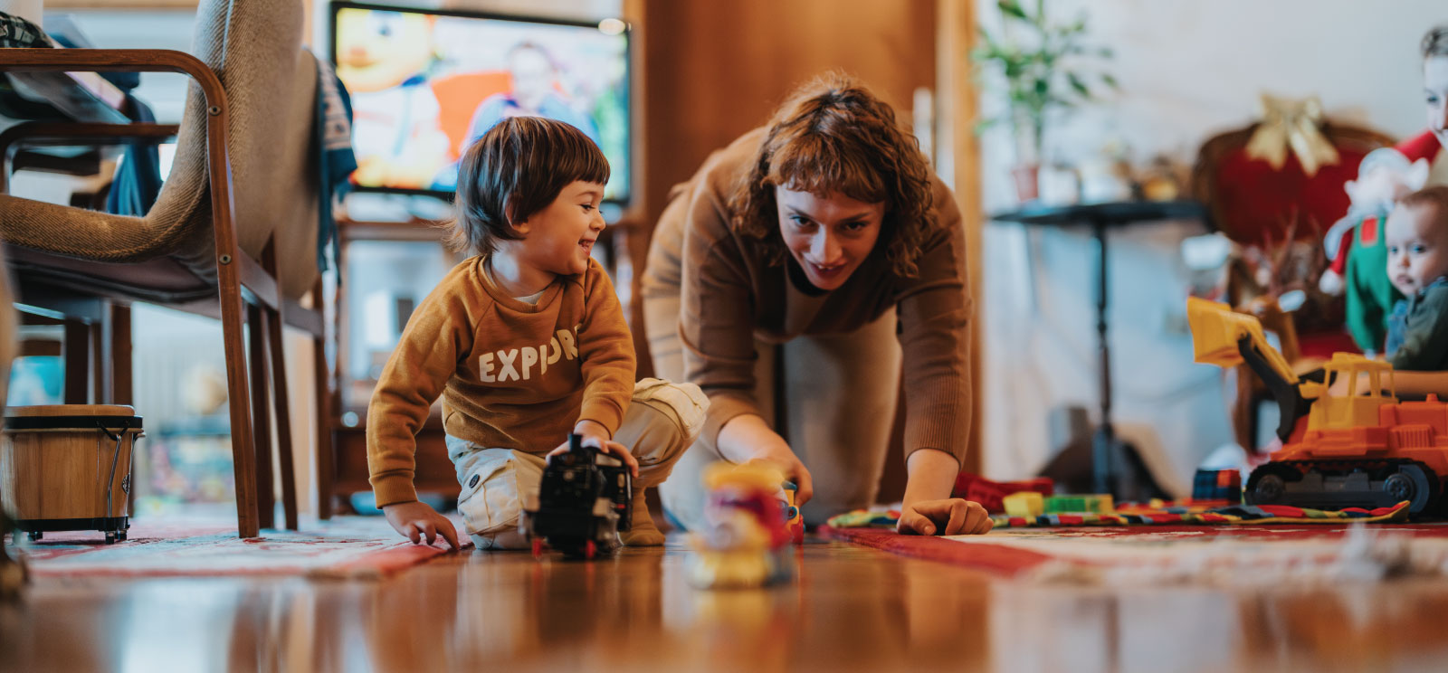 Mother and child playing together at home.