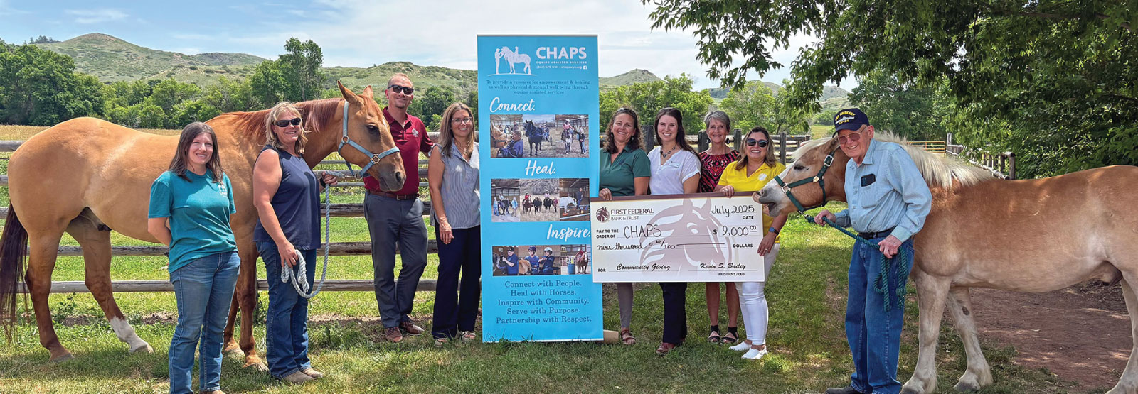 Group of First Federal employees with members of CHAPS Equine Assisted Services.